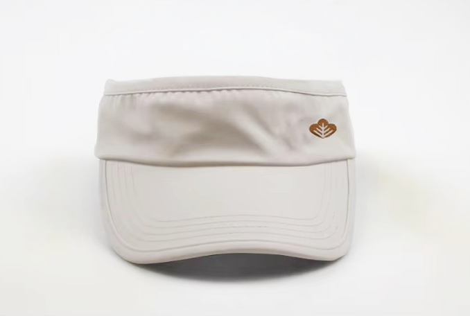 Beige visor cap with a logo on a white background